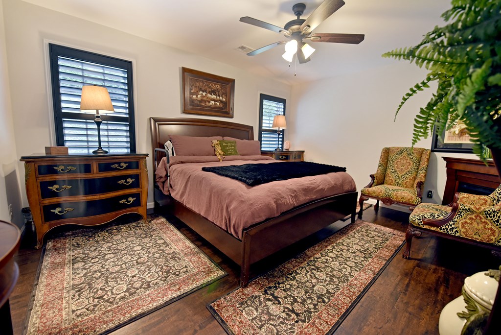 54 Linda Lane Blue Ridge, GA 30513 - Photo 17 of 59 a bedroom with a bed and wooden floor