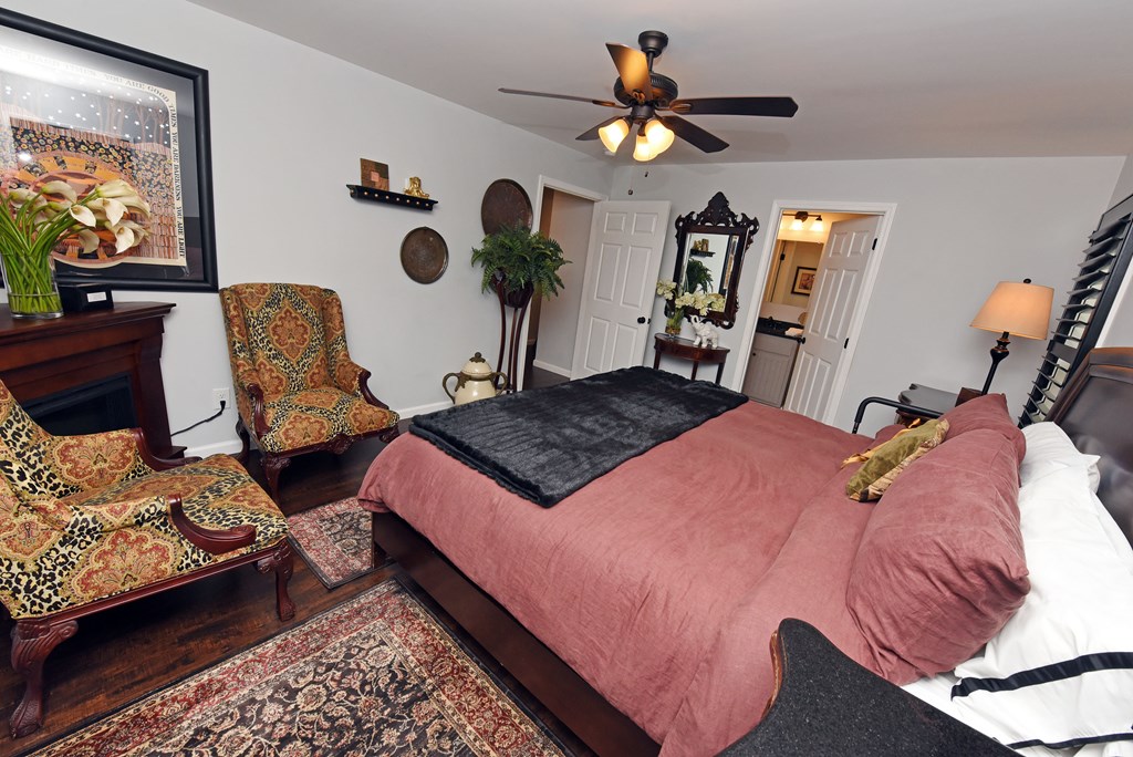 54 Linda Lane Blue Ridge, GA 30513 - Photo 19 of 59 a bedroom with two beds and a chandelier