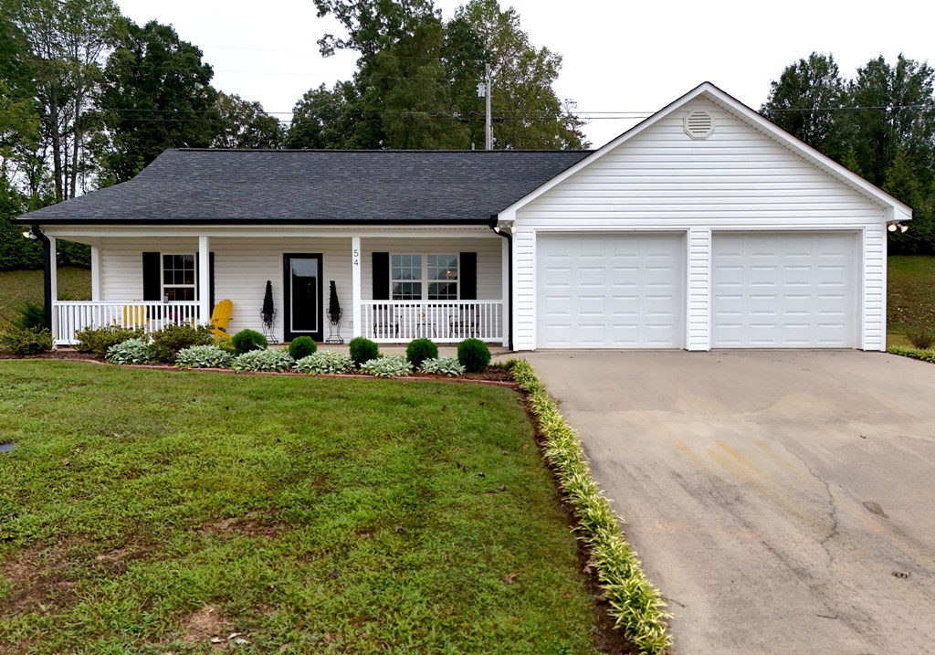 54 Linda Lane Blue Ridge, GA 30513 - Photo 56 of 59 a front view of house with yard and green space
