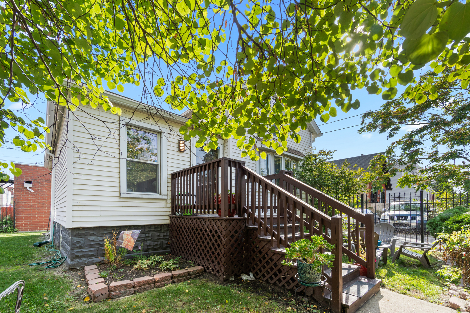 1111 South Campbell Avenue Chicago, IL 60612 - Photo 2 of 28 a balcony with flower plants in front of house