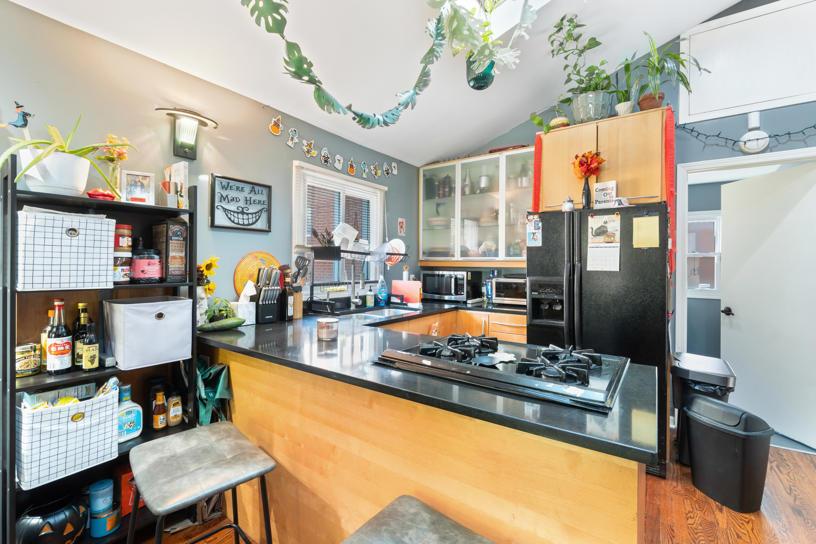1111 South Campbell Avenue Chicago, IL 60612 - Photo 25 of 28 a view of a kitchen with a dining table and chairs