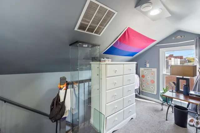 a view of a kitchen with appliances and a window