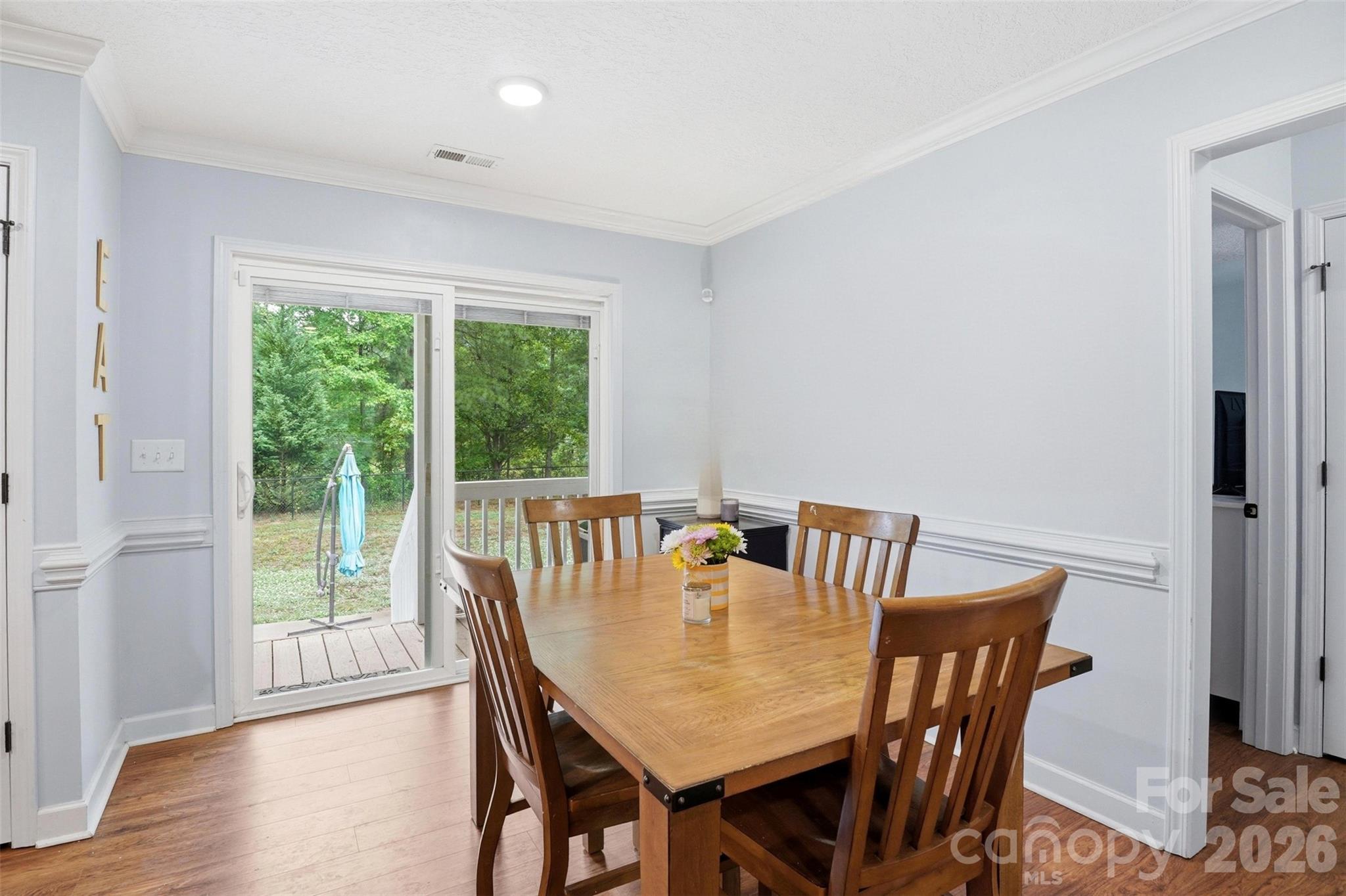 810 Tirzah Road York, SC 29745 - Photo 8 of 29 a view of a dining room with furniture window and wooden floor