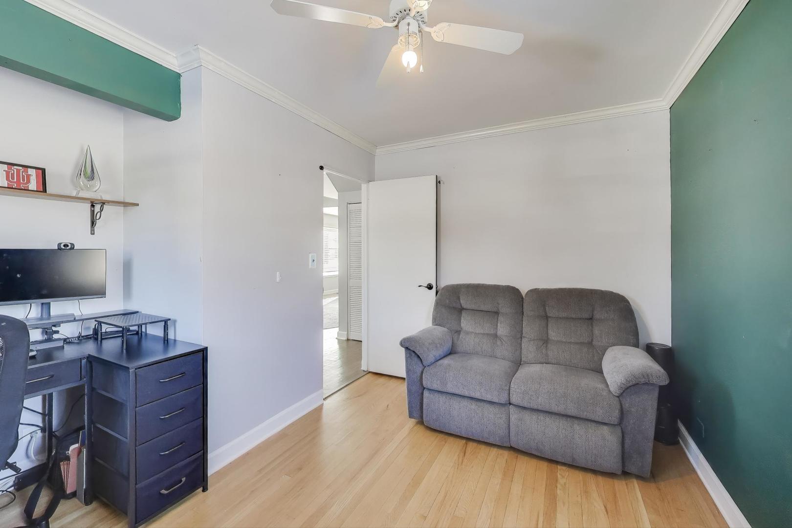 218 North School Street Mount Prospect, IL 60056 - Photo 12 of 30 a living room with furniture and a wooden floor