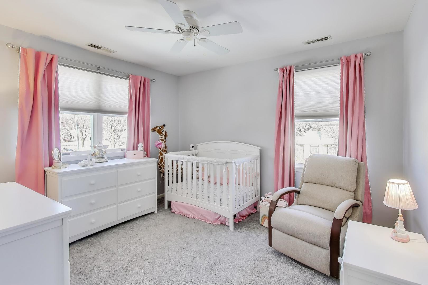 218 North School Street Mount Prospect, IL 60056 - Photo 21 of 30 a bedroom with a bed and window