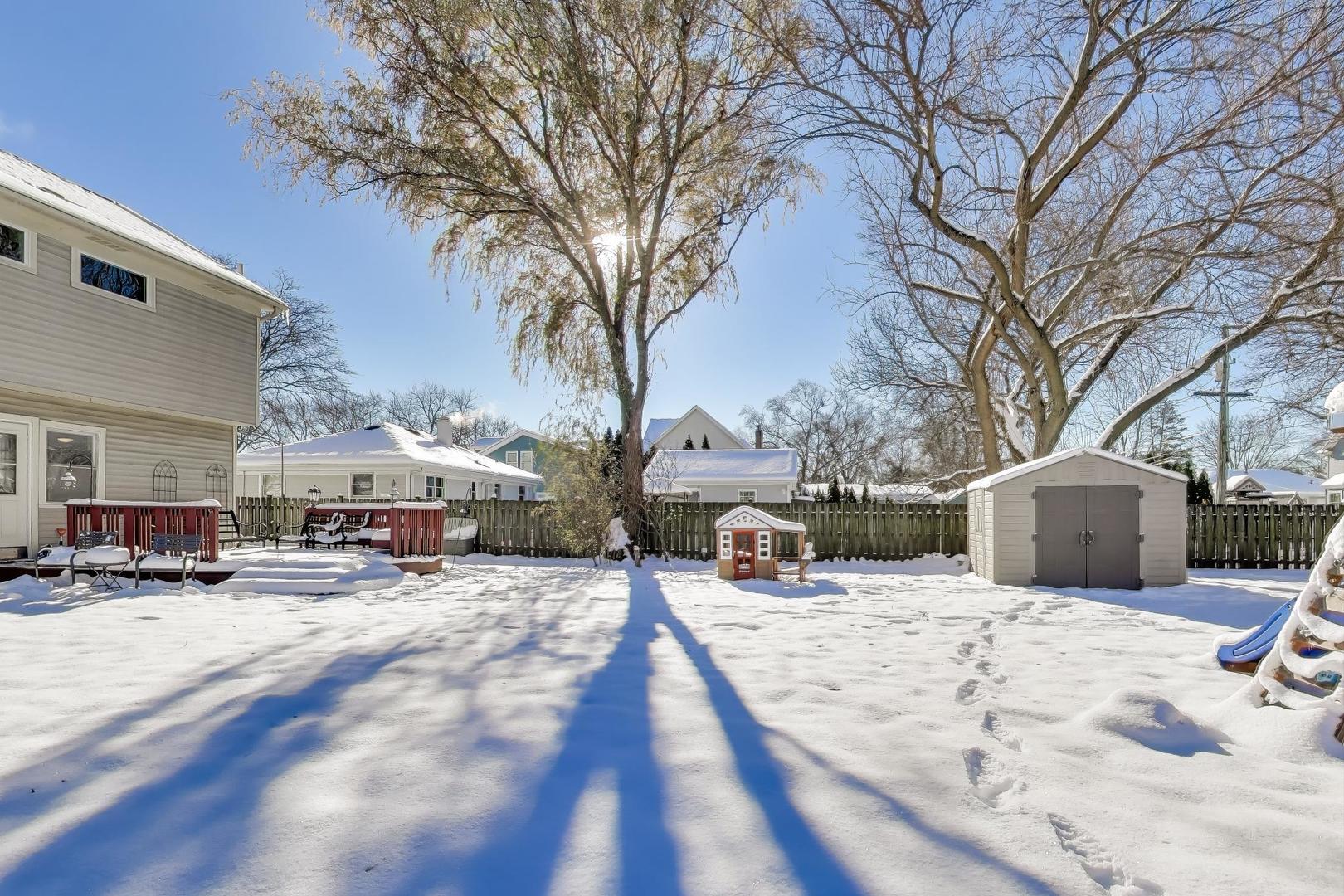 218 North School Street Mount Prospect, IL 60056 - Photo 27 of 30 a view of a white house covered in snow
