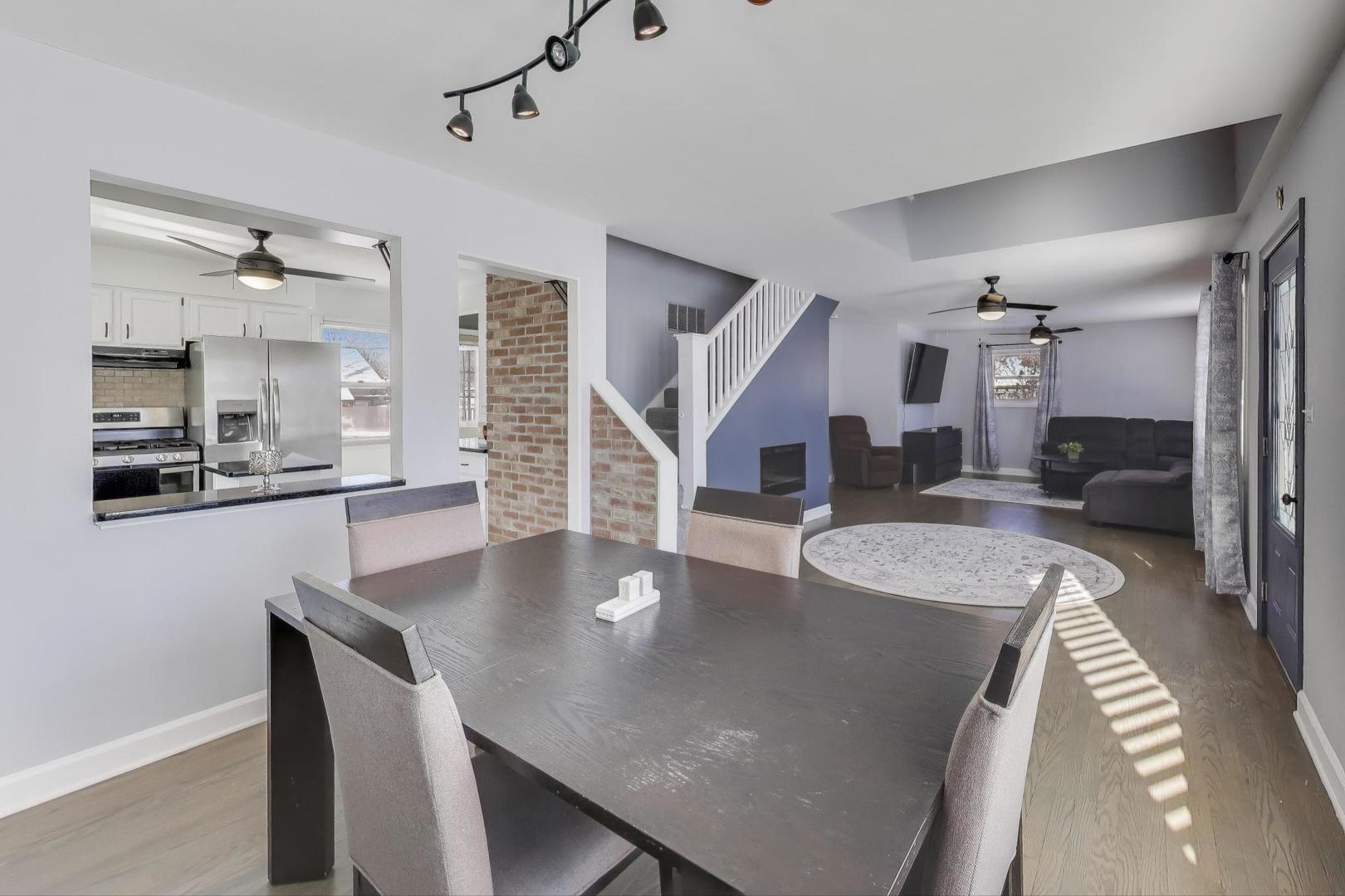 218 North School Street Mount Prospect, IL 60056 - Photo 7 of 30 a dining room with furniture and wooden floor