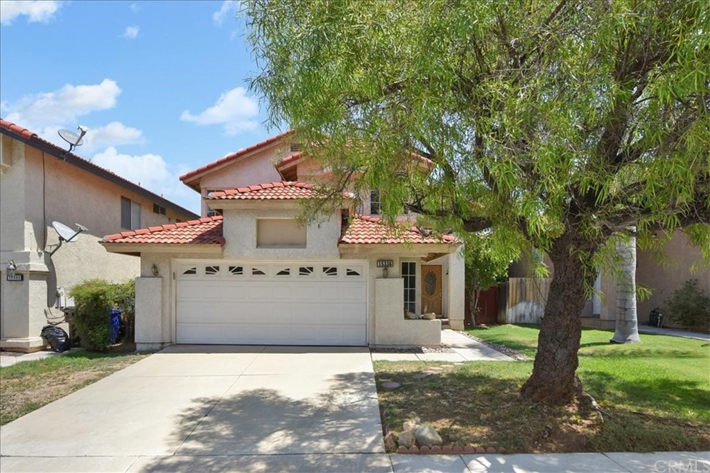 15336 Tobarra Road Fontana, CA 92337 - Photo 1 of 1 a front view of a house with garden