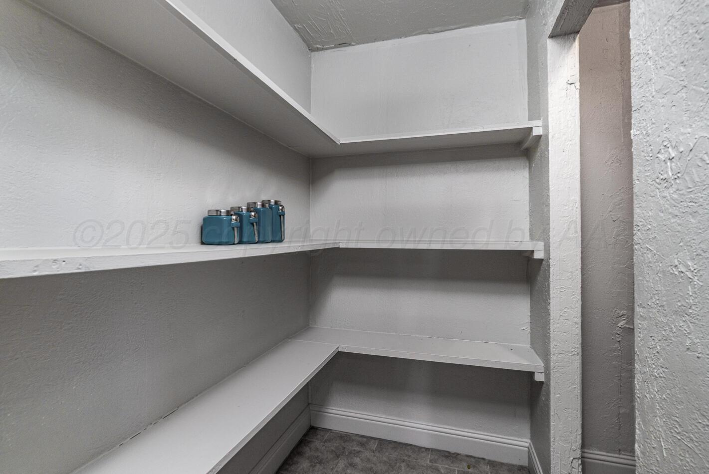 8015 Upton Road Amarillo, TX 79119 - Photo 7 of 16 a close view of cabinet