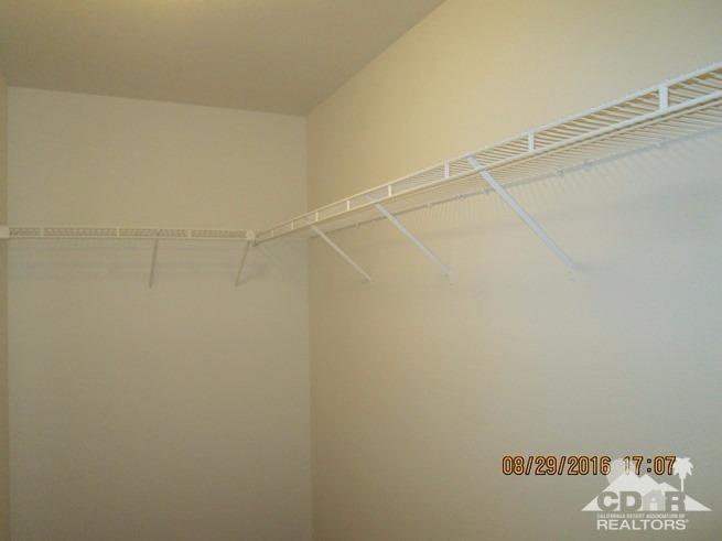 41643 Petersfield Road Bermuda Dunes, CA 92203 - Photo 18 of 29 a view of a room with racks on the wall