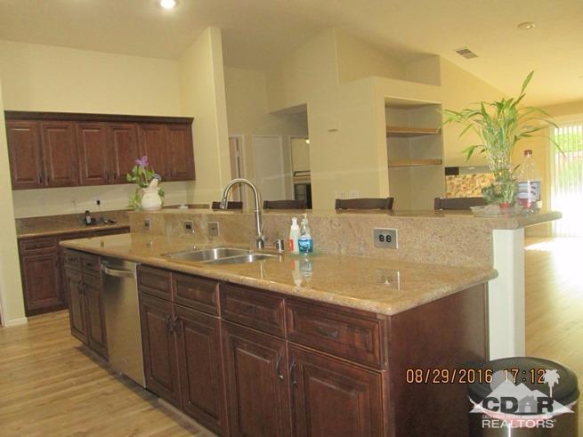 41643 Petersfield Road Bermuda Dunes, CA 92203 - Photo 8 of 29 a kitchen with a sink and a cabinets