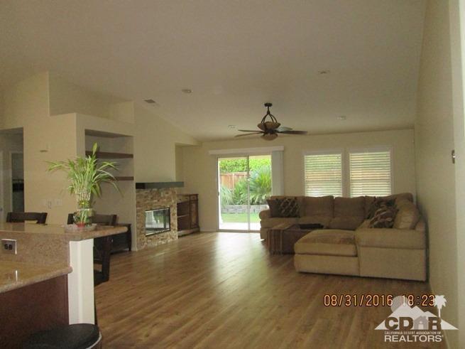 41643 Petersfield Road Bermuda Dunes, CA 92203 - Photo 9 of 29 a living room with furniture and a fireplace