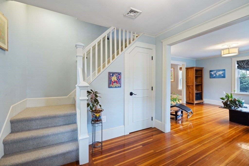 5 Belfry Terrace Lexington, MA 02421 - Photo 18 of 40 a view of entryway with wooden floor and stairs