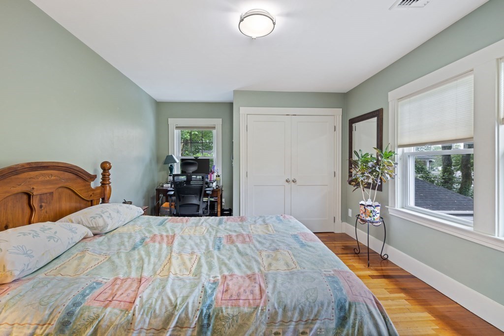 5 Belfry Terrace Lexington, MA 02421 - Photo 29 of 40 a bedroom with a bed and a large window