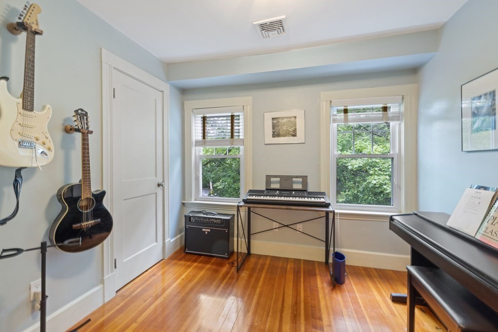 5 Belfry Terrace Lexington, MA 02421 - Photo 31 of 40 a view of a livingroom with wooden floor and furniture