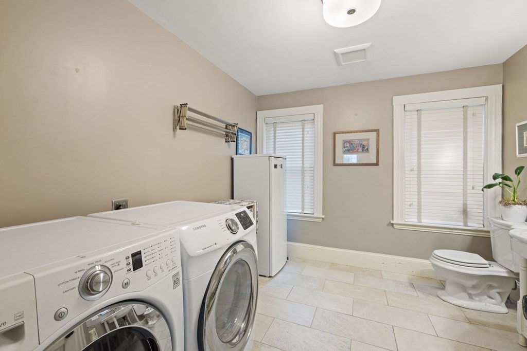 5 Belfry Terrace Lexington, MA 02421 - Photo 34 of 40 a utility room with dryer and washer