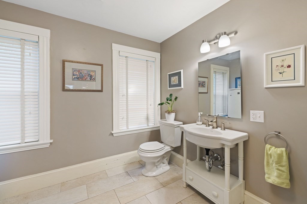 5 Belfry Terrace Lexington, MA 02421 - Photo 35 of 40 a bathroom with a toilet sink and mirror