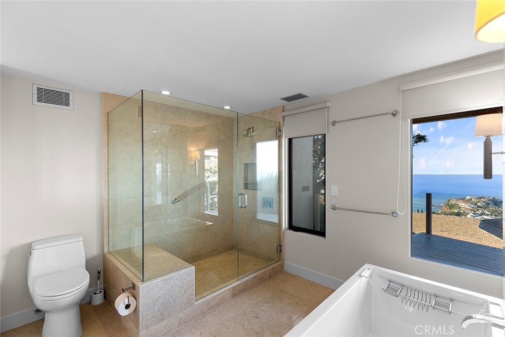 1503 Emerald Bay Laguna Beach, CA 92651 - Photo 23 of 32 a bathroom with a shower and a toilet