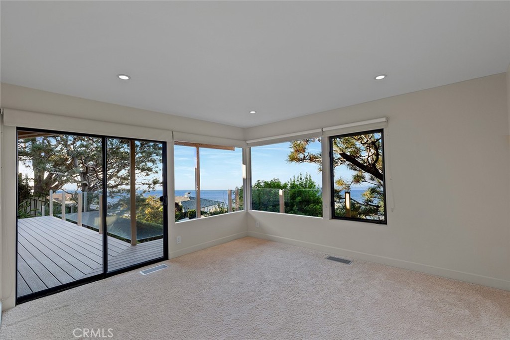 1503 Emerald Bay Laguna Beach, CA 92651 - Photo 26 of 32 a view of an empty room with a large window