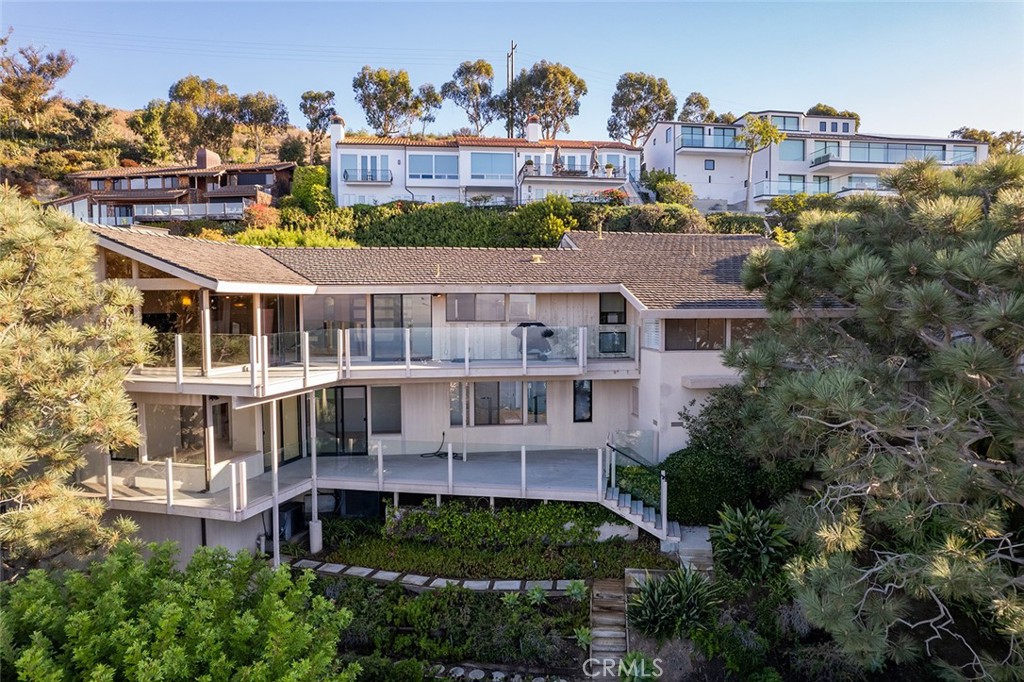 1503 Emerald Bay Laguna Beach, CA 92651 - Photo 3 of 32 a aerial view of a house with a yard