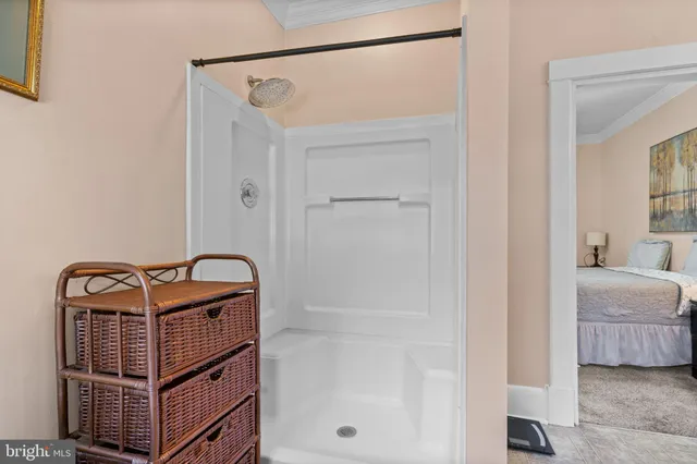 a room that has a bed and a mirror