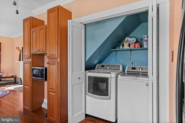 a utility room with dryer and washer