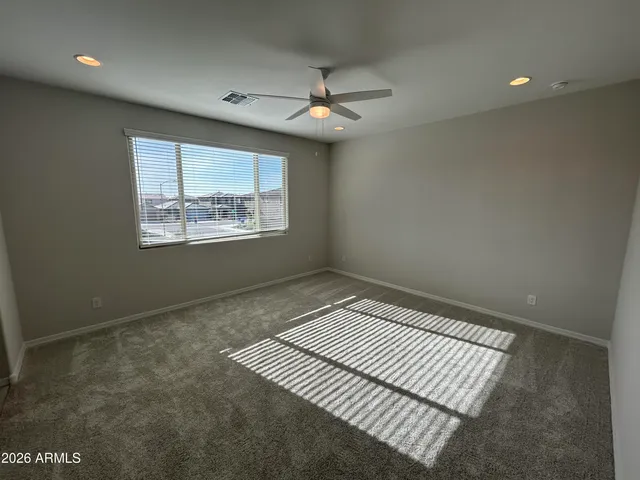 en empty room with windows