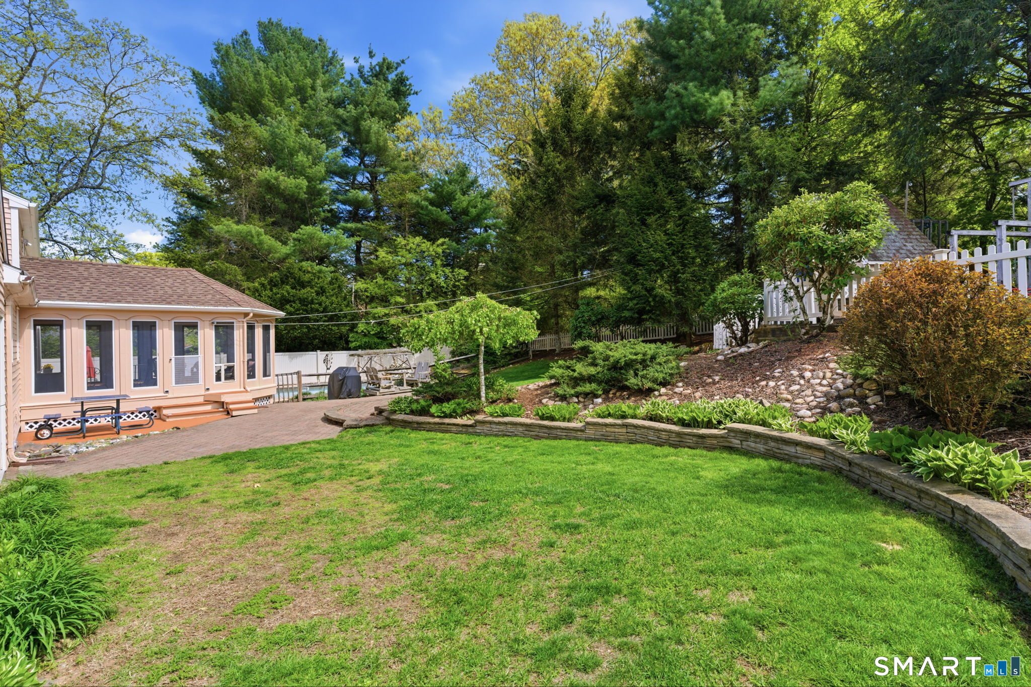 79 Buckboard Lane Bristol, CT 06010 - Photo 12 of 40 a front view of a house with garden and trees