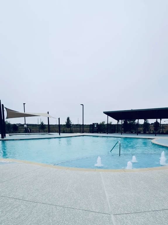 217 Skyfire Street Hutto, TX 78634 - Photo 14 of 15 a view of a swimming pool