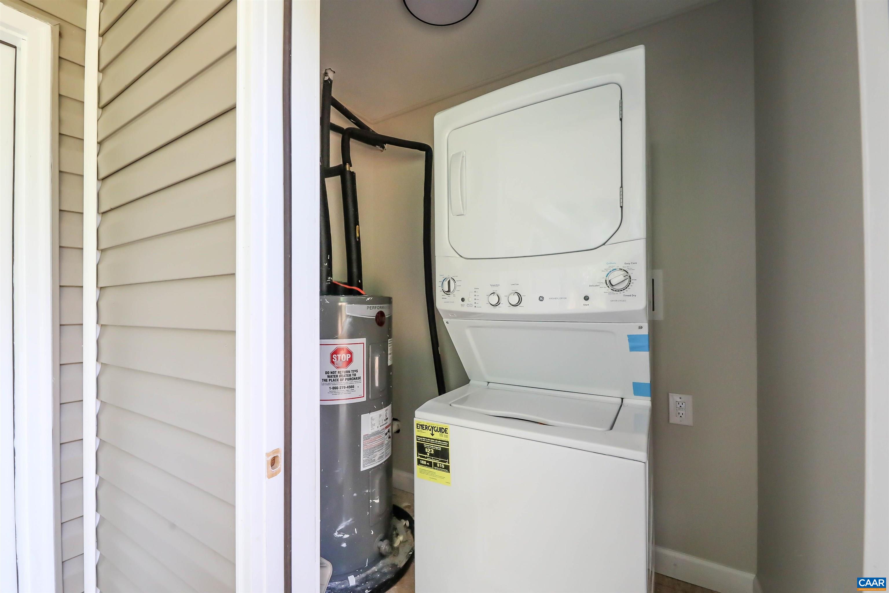 8901 Chestnut Grove Road Esmont, VA 22937 - Photo 16 of 44 a utility room with dryer and washer