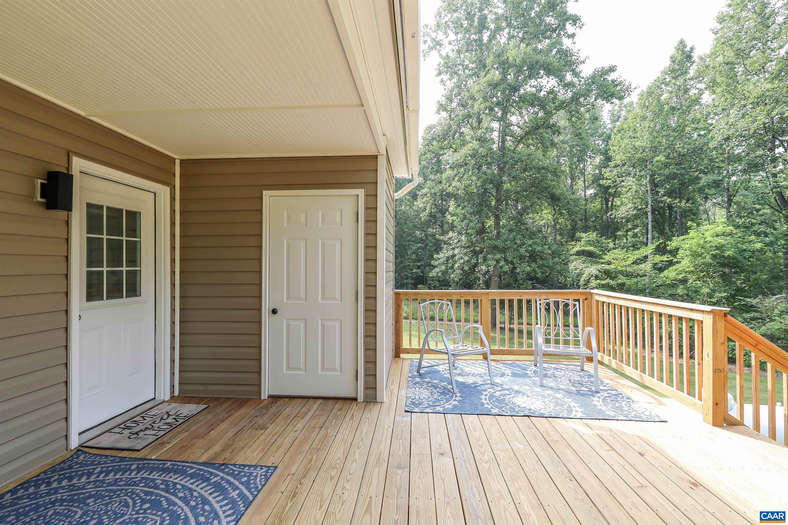 8901 Chestnut Grove Road Esmont, VA 22937 - Photo 17 of 44 a view of backyard with a deck