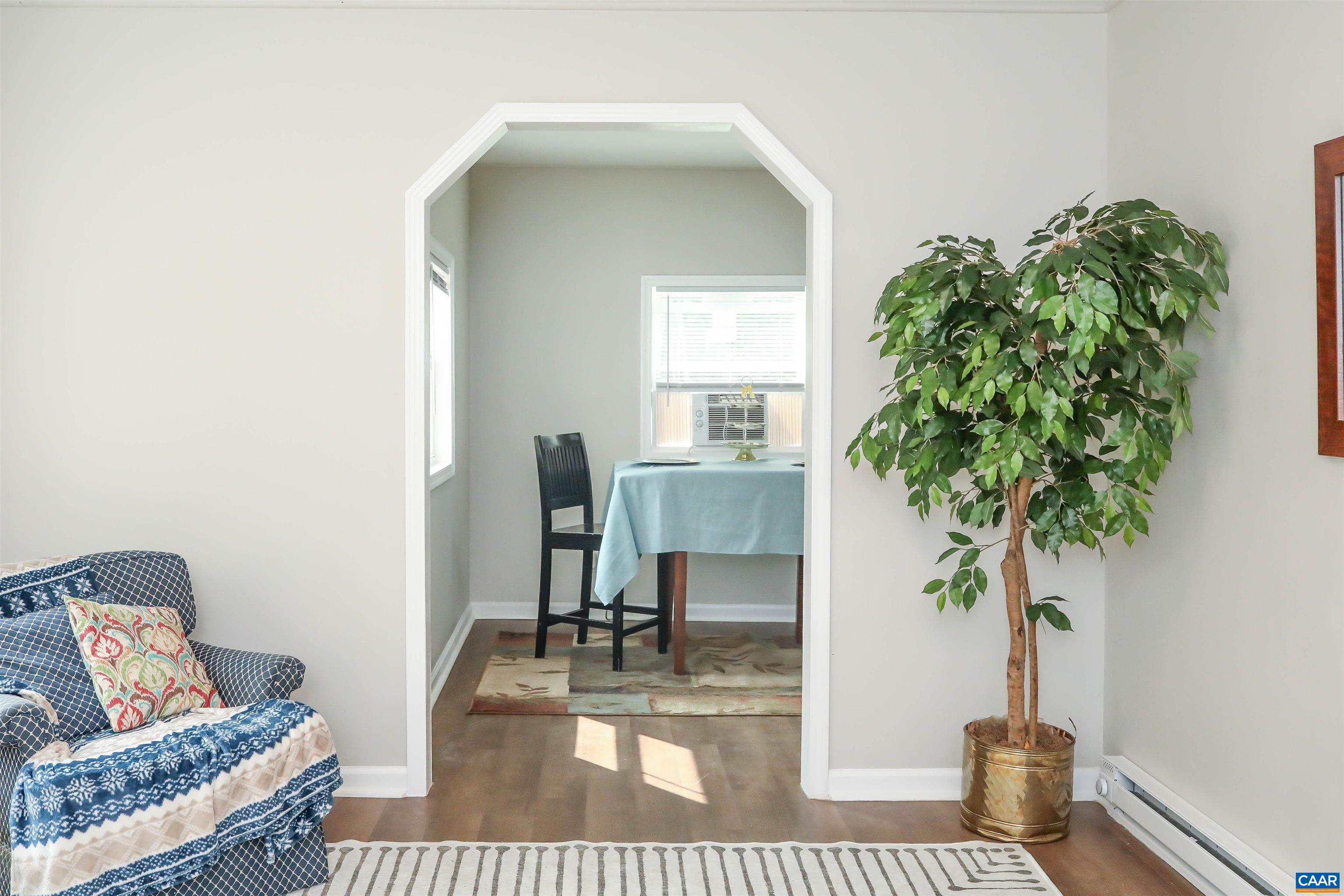 8901 Chestnut Grove Road Esmont, VA 22937 - Photo 25 of 44 a living room with furniture and a potted plant