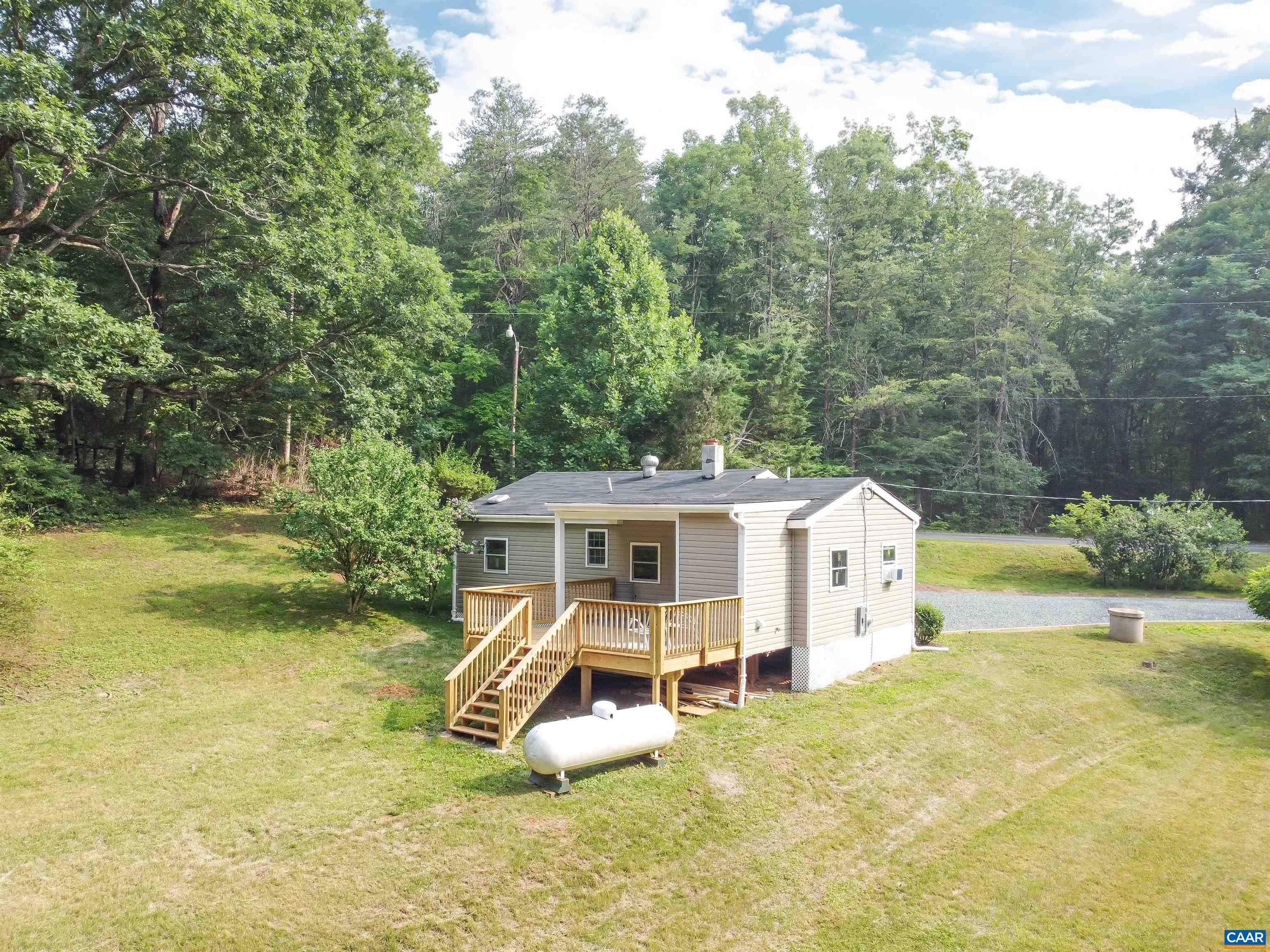8901 Chestnut Grove Road Esmont, VA 22937 - Photo 41 of 44 a view of a house with swimming pool and sitting area