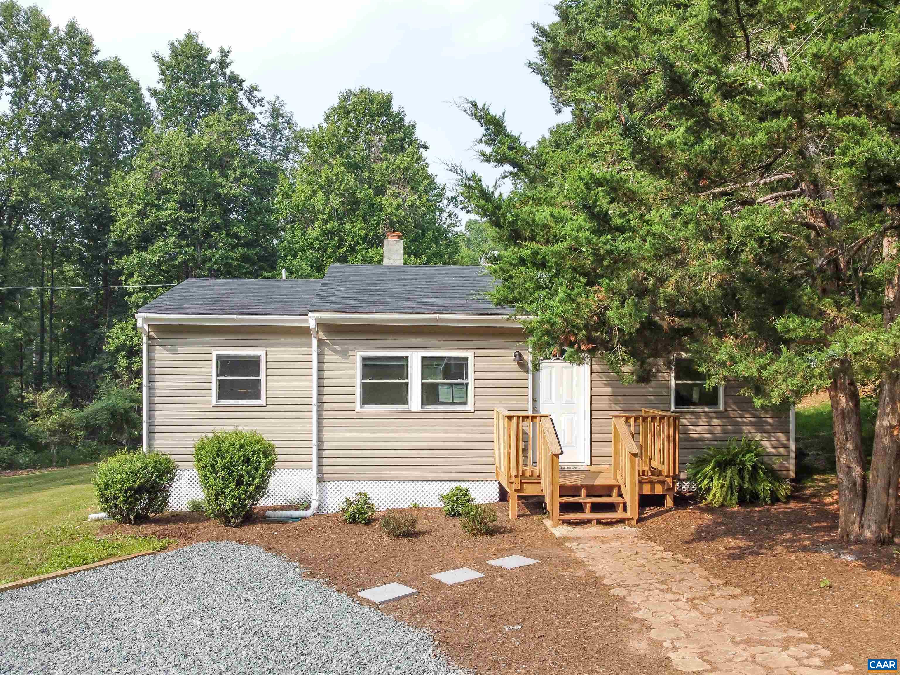 8901 Chestnut Grove Road Esmont, VA 22937 - Photo 8 of 44 a view of a house with a patio