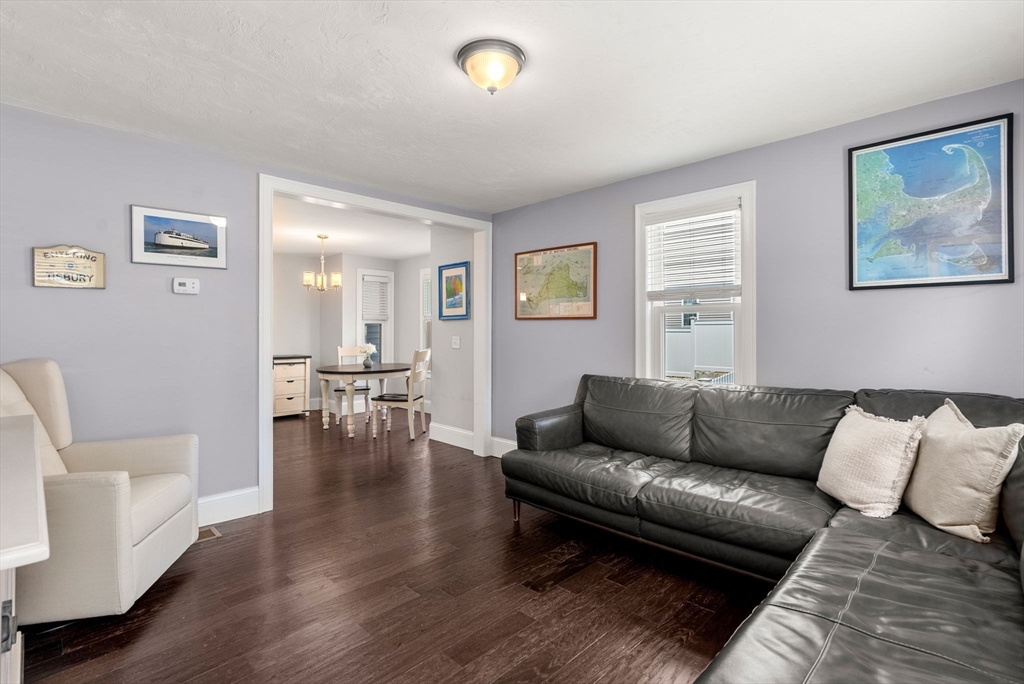 68 Prospect Street Canton, MA 02021 - Photo 3 of 28 a living room with furniture and painting on the wall