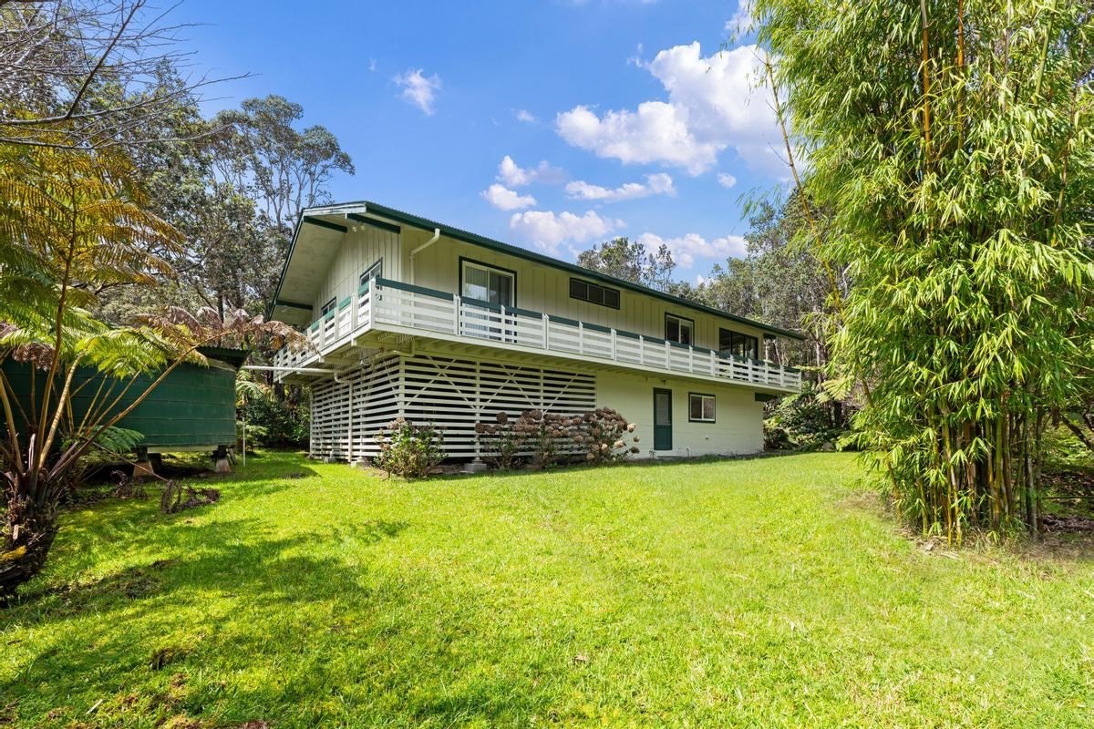 19-4252 Wright Road Volcano, HI 96785 - Photo 3 of 30 a view of a house with a yard