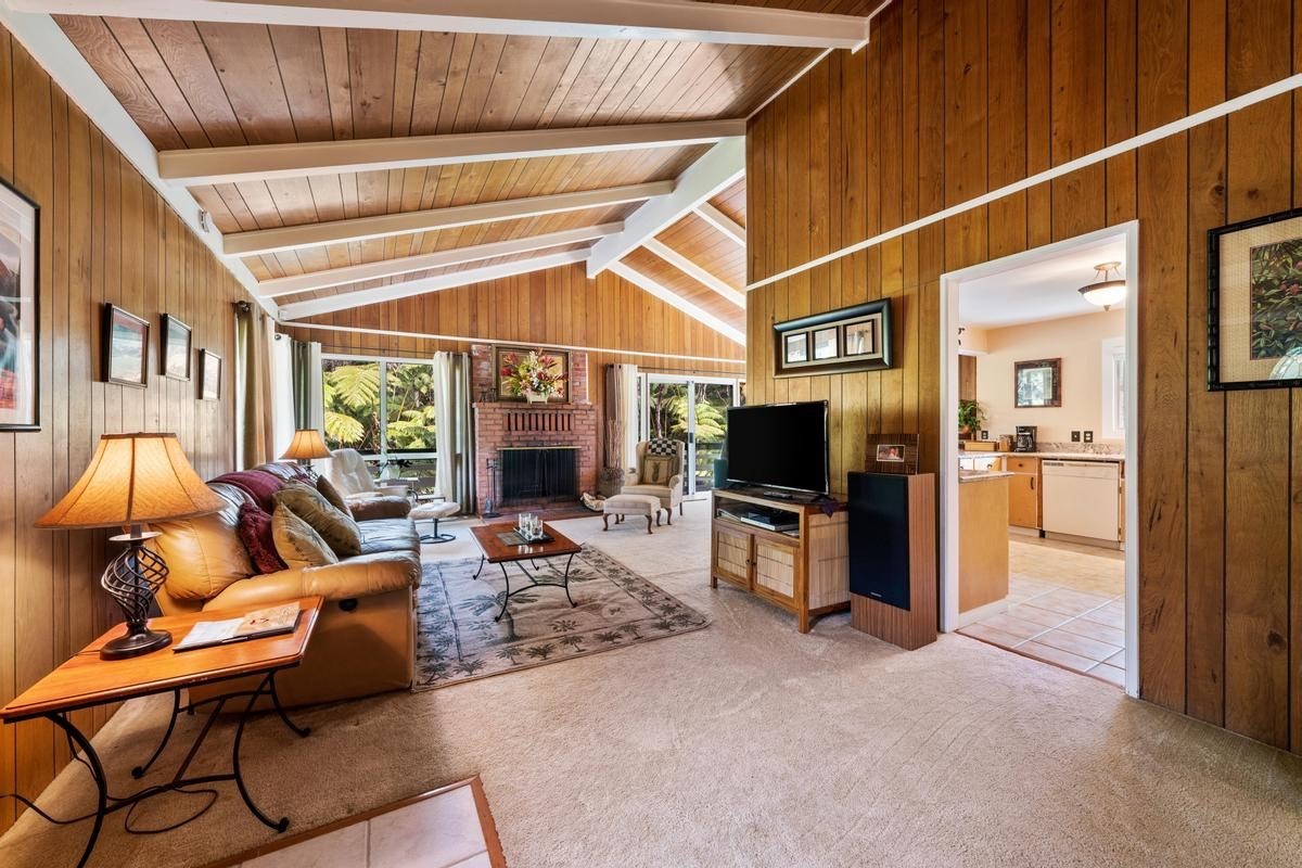 19-4252 Wright Road Volcano, HI 96785 - Photo 10 of 30 a living room with furniture and a flat screen tv