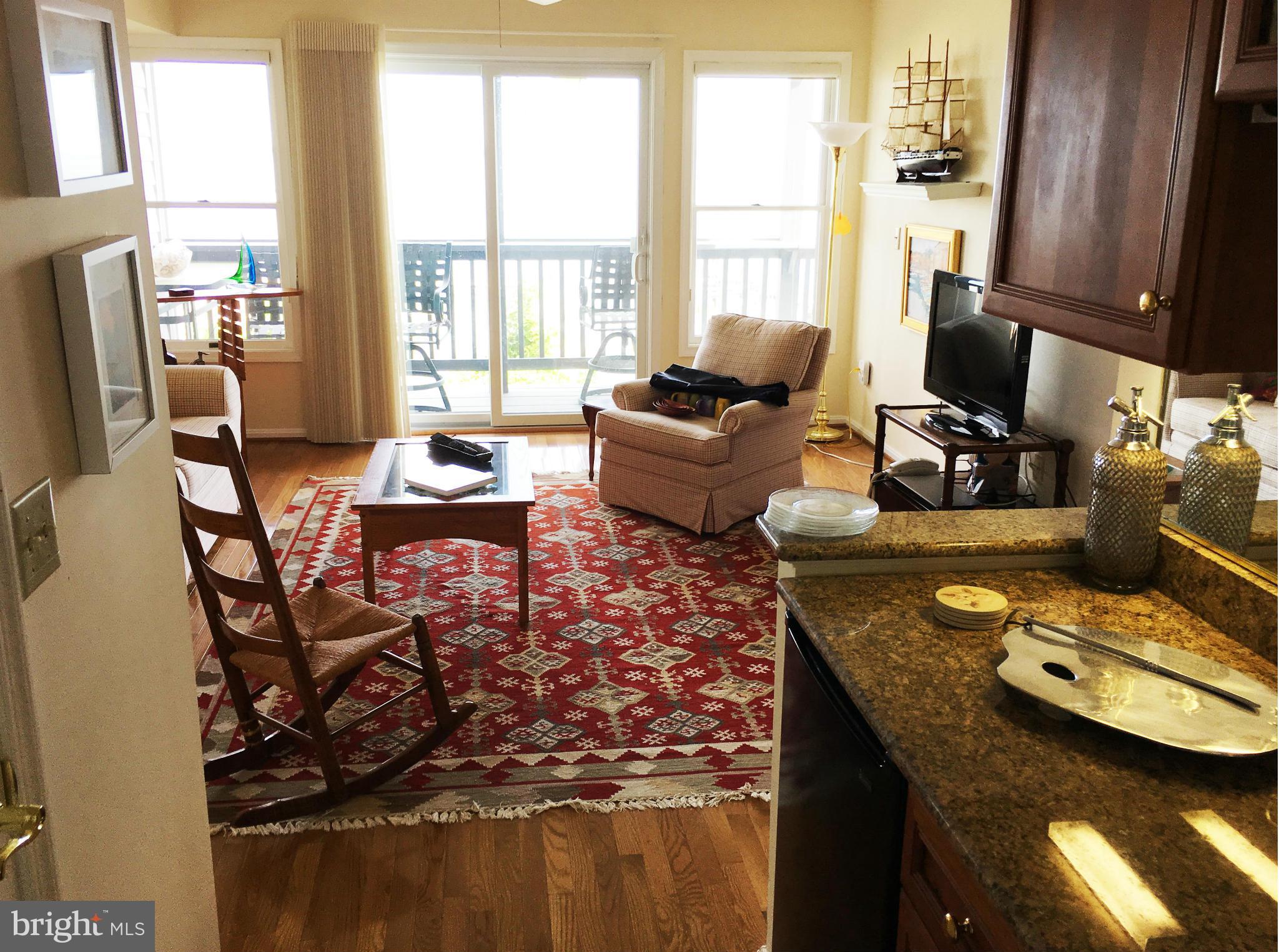 1 Bayview Road, Unit 12B Betterton, MD 21610 - Photo 4 of 15 Open Living Room. Deck with Bay view. SUNSETS!