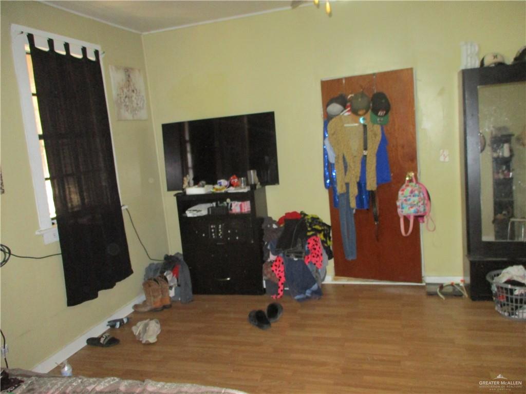 207 South Avasolo Street Rio Grande City, TX 78582 - Photo 5 of 8 a view of a room with gym equipment