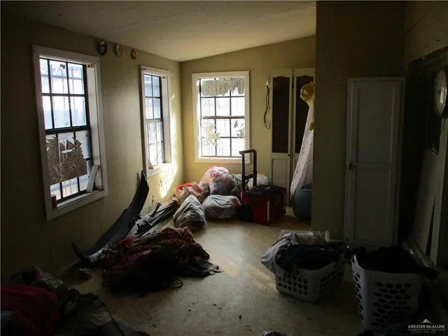 a view of a backyard of the house