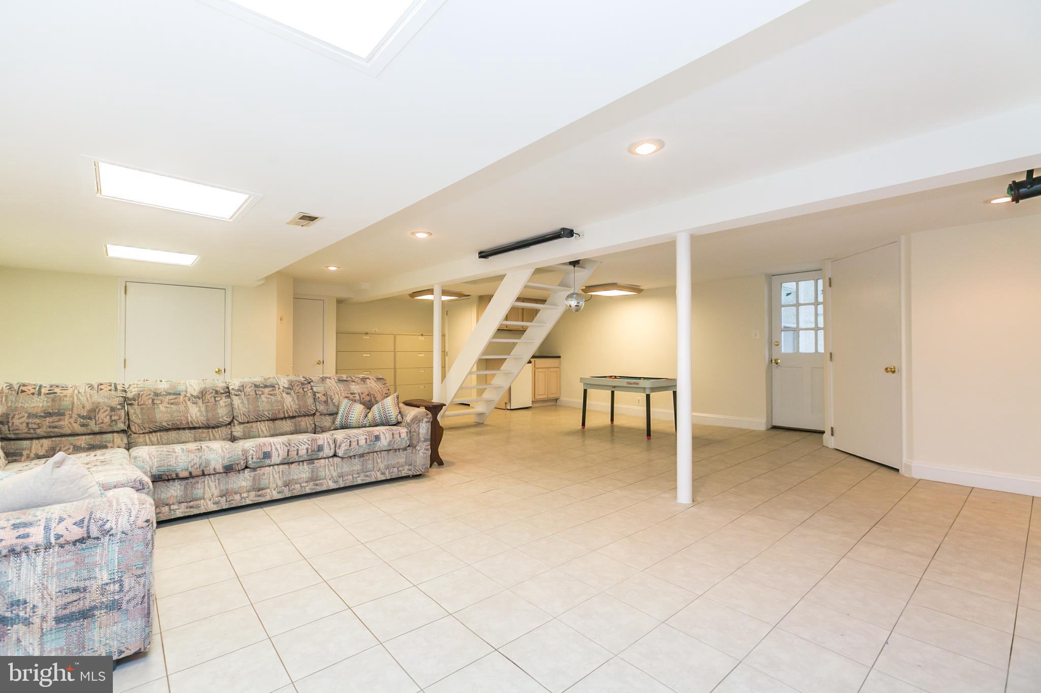 611 Piccadilly Road Baltimore, MD 21204 - Photo 29 of 41 Huge, lower level rec room!