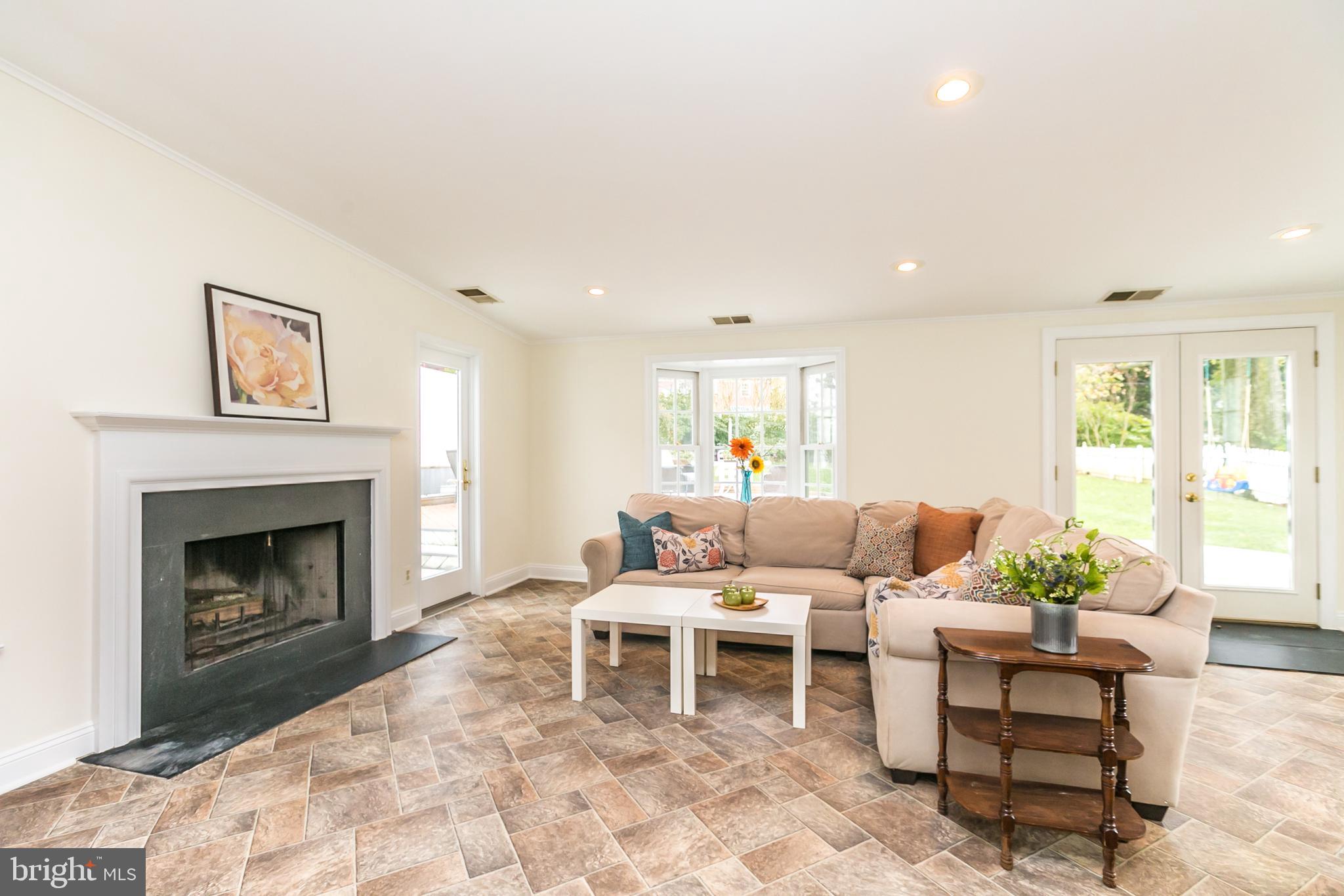 611 Piccadilly Road Baltimore, MD 21204 - Photo 10 of 41 Bright and spacious family room with WB fireplace