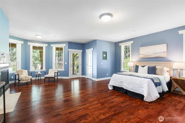 a bedroom with a bed and a lamp