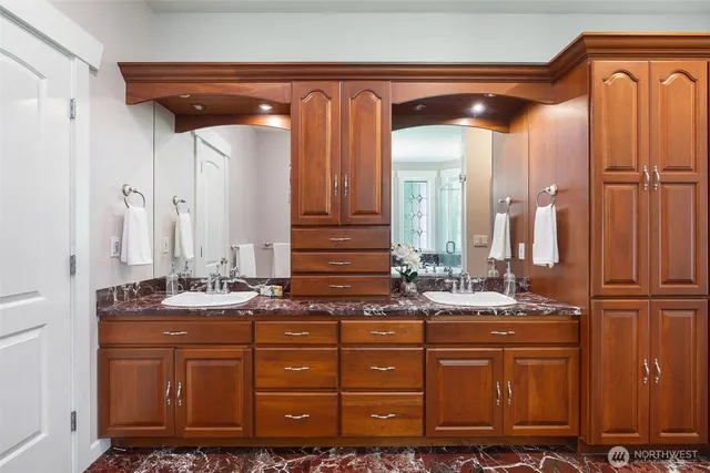 a bed room with a bed and a lamp