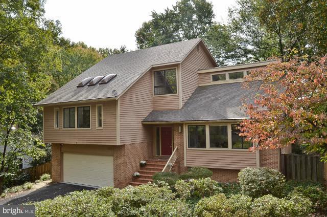 7307 Hooking Road McLean, VA 22101 - Photo 1 of 29 front view of a house with a yard