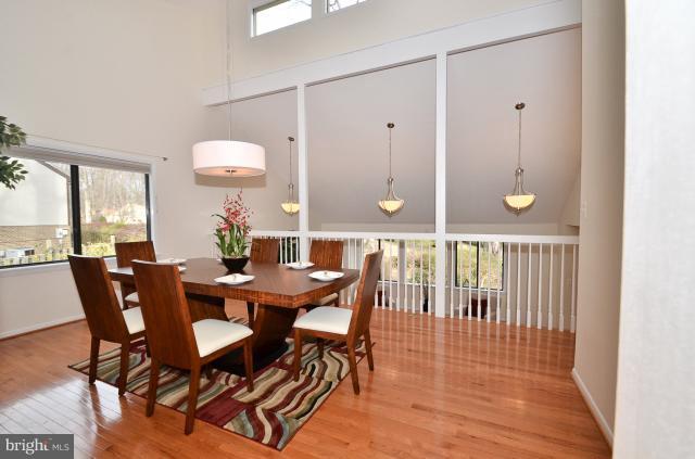 7307 Hooking Road McLean, VA 22101 - Photo 2 of 29 a view of a dining room and furniture
