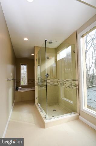 7307 Hooking Road McLean, VA 22101 - Photo 11 of 29 a bathroom with a shower