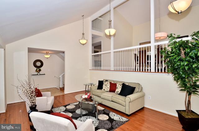 7307 Hooking Road McLean, VA 22101 - Photo 12 of 29 a living room with furniture and flowers