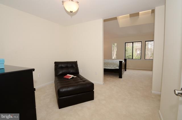 7307 Hooking Road McLean, VA 22101 - Photo 5 of 29 a living room with furniture and a window