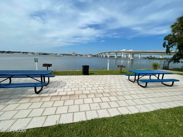 a view of a terrace with chairs